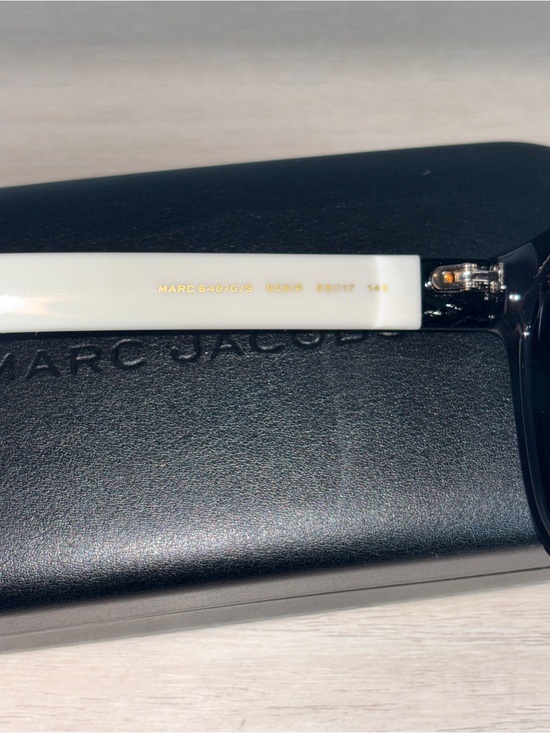 Brand new Marc Jacobs Black 648/G/S Sunglasses with White Temple Tips.